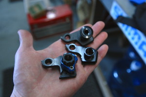 These are derailleur hangers. There are many different versions... make sure you have the correct spare for your bike